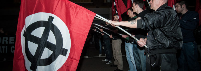men holding far right flags